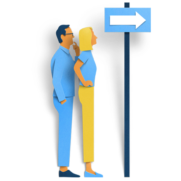 Couple looking at direction sign